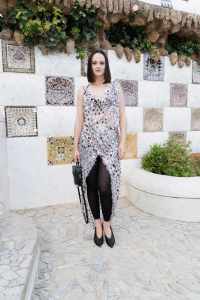 Noémie Merlant front row at the Louis Vuitton Cruise 2025 show.