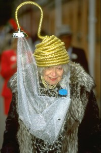 Portrait of Gertrude Shilling of Great Britain showing off her hat which looks like a shower during Royal Ascot week at Ascot racecourse in Ascot, England