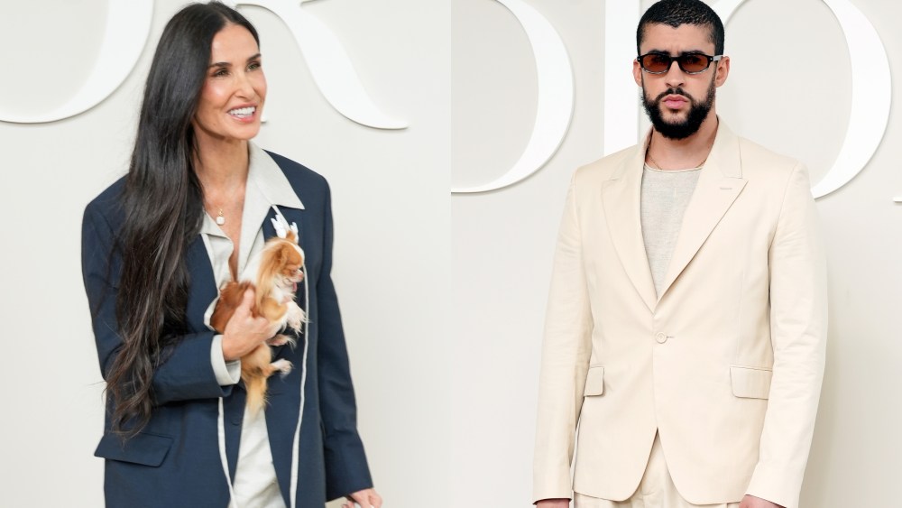 Demi Moore, left, and Bad Bunny attend the Dior menswear spring/summer 2025 show as part of Paris Fashion Week on June 21 in Paris.