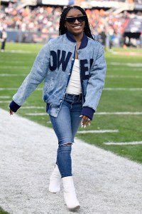 CHICAGO, ILLINOIS - NOVEMBER 24: Simone Biles is seen on the field during halftime of a game between the Chicago Bears and the Minnesota Vikings at Soldier Field on November 24, 2024 in Chicago, Illinois. (Photo by Quinn Harris/Getty Images)