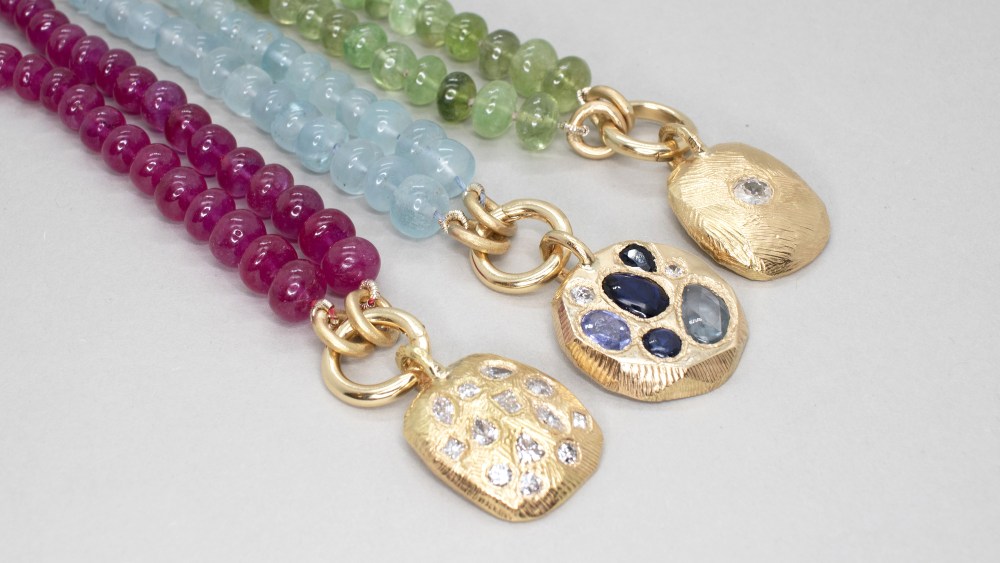 Page Sargisson's 18k gold one-of-a-kind necklaces, in mosaic diamonds, mosaic sapphires, and diamond solitaire.