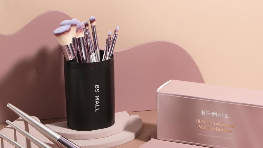 makeup brush set on a vanity table