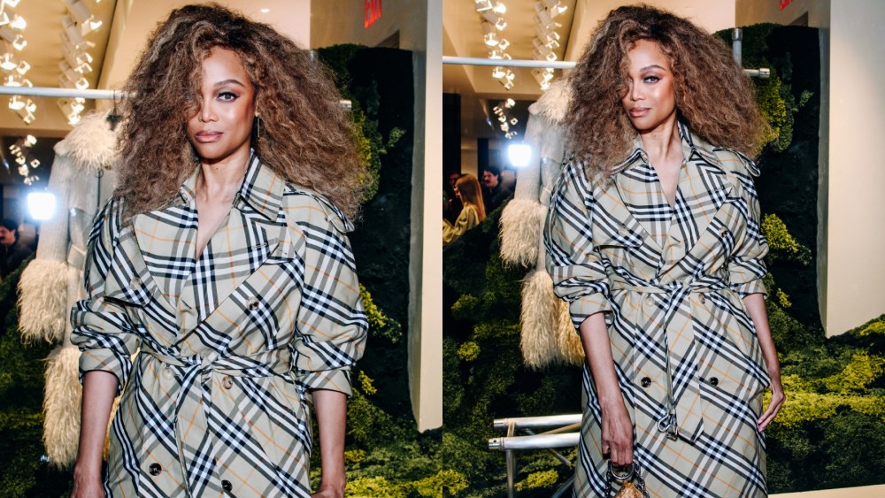 Tyra Banks at the Burberry flagship store reopening on Oct. 16 in New York, tartan, plaid, trench coat
