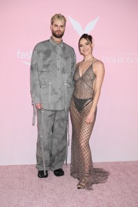 Tucker Halpern and Sophie Hawley-Weld at the Victoria's Secret Fashion Show held at the Brooklyn Navy Yard on October 15, 2024 in New York, New York.