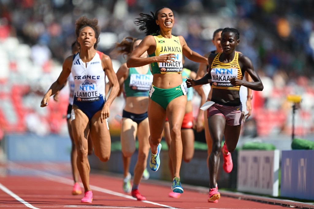BUDAPEST, HUNGARY - AUGUST 23: Adelle Tracey of Team Jamaica and Halimah Nakaayi of Team Uganda compete in the Women's 800m Heats during day five of the World Athletics Championships Budapest 2023 at National Athletics Centre on August 23, 2023 in Budapest, Hungary. (Photo by Hannah Peters/Getty Images)