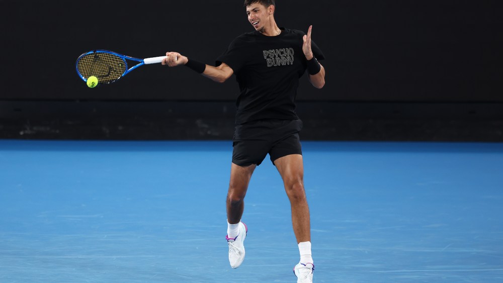 MELBOURNE, AUSTRALIA - JANUARY 06: Alexei Popyrin of Australia plays a forehand during a practice session ahead of the 2025 Australian Open at Melbourne Park on January 06, 2025 in Melbourne, Australia. (Photo by Graham Denholm/Getty Images)