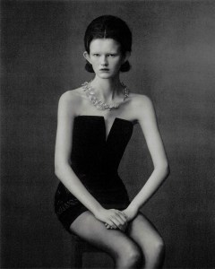 Rahul Mishra haute couture velvet “The Ravens’ Escapade” dress with bird embroideries under a mounted, framed corset hand-embroidered in silk. Boucheron’s Rosier necklace from the Histoire de Style, "Untamed Nature" high jewelry collection featuring  diamonds with white gold.