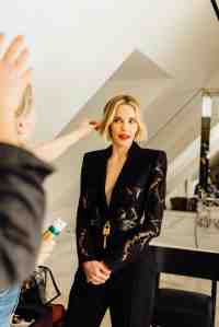 A look at Leslie Bibb getting ready for the Balmain Fall 2025 show in Paris.