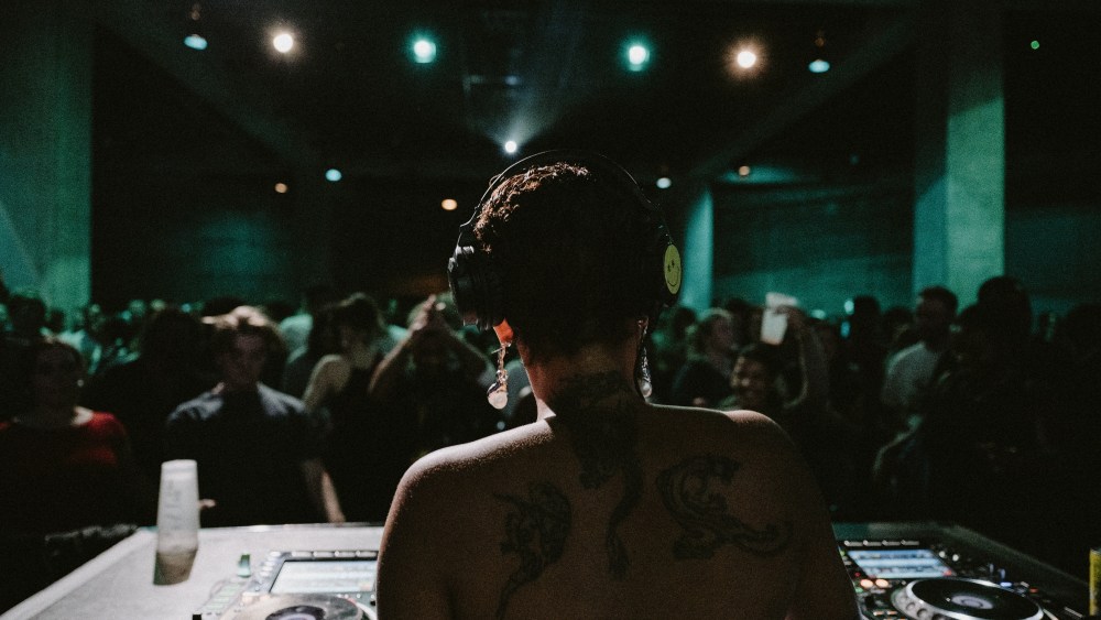 Musician Little Simz DJing at the Tate Modern.
