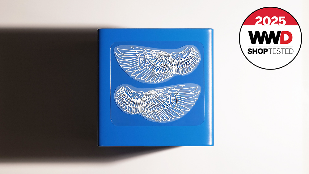under-eye patches with a feather motif 
 that our editors tested on a blue background