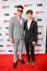 Robin Thicke, Julian Thicke at the 2025 iHeartRadio Music Awards held at the Dolby Theatre on March 17, 2025 in Los Angeles, California.