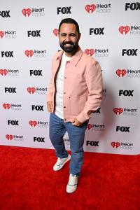 Enrique Santos at the 2025 iHeartRadio Music Awards held at the Dolby Theatre on March 17, 2025 in Los Angeles, California.
