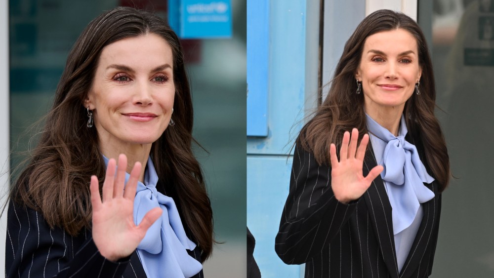 Queen Letizia wears a pinstripe suit for a meeting at UNICEF headquarters in Madrid.