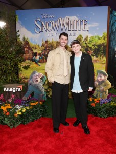 LOS ANGELES, CALIFORNIA - MARCH 15: (L-R) Jonathan Tilkin and Anthony Gargiula joins Sneezy & Sleepy at the Allegra activation on the red carpet for Disney's "Snow White" premiere at El Capitan Theatre on March 15, 2025 in Hollywood, California. The Allegra activation asks what Sneezy and Sleepy would be like if they weren't sneezy or sleepy. (Photo by Phillip Faraone/Getty Images for Allegra)