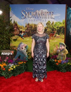 LOS ANGELES, CALIFORNIA - MARCH 15: Mandy Walker joins Sneezy & Sleepy at the Allegra activation on the red carpet for Disney's "Snow White" premiere at El Capitan Theatre on March 15, 2025 in Hollywood, California. The Allegra activation asks what Sneezy and Sleepy would be like if they weren't sneezy or sleepy. (Photo by Phillip Faraone/Getty Images for Allegra)