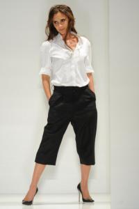 Fashion designer Victoria Beckham on the runway after her spring 2014 show at Cafe Rouge.