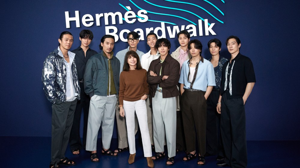 Véronique Nichania with ten South Korean stars that walked the “Hermès Boardwalk” reprised runway show.