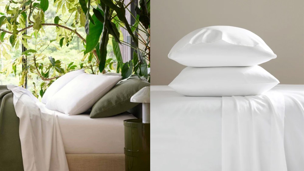 A bed in new sheets by Brooklinen next to lots of plants and trees; two white pillows resting on a white flat sheet