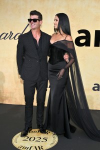 Robin Thicke and April Love Geary
