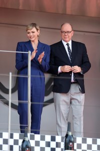 MONTE-CARLO, MONACO - MAY 26: Prince Albert of Monaco and  Princess Charlene look on, from the podium during the F1 Grand Prix of Monaco at Circuit de Monaco on May 26, 2024 in Monte-Carlo, Monaco. (Photo by Ryan Pierse/Getty Images)