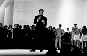 Calvin Klein (C) and Mark Wahlberg (wearing jeans) appear onstage during a benefit event at the Hollywood Bowl in Hollywood, California, on June 4, 1993. (Photo by Ted Dayton/WWD/Penske Media via Getty Images)