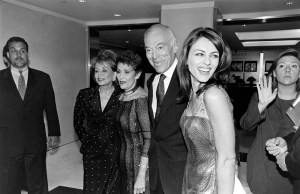 (L-R, foreground) Barbara Walters, Evelyn Lauder, Leonard Lauder, and Elizabeth Hurley attend a Breast Cancer Research Foundation benefit at Christie's in New York City on May 5, 1999. (Photo by Steve Eichner/Penske Media via Getty Images)