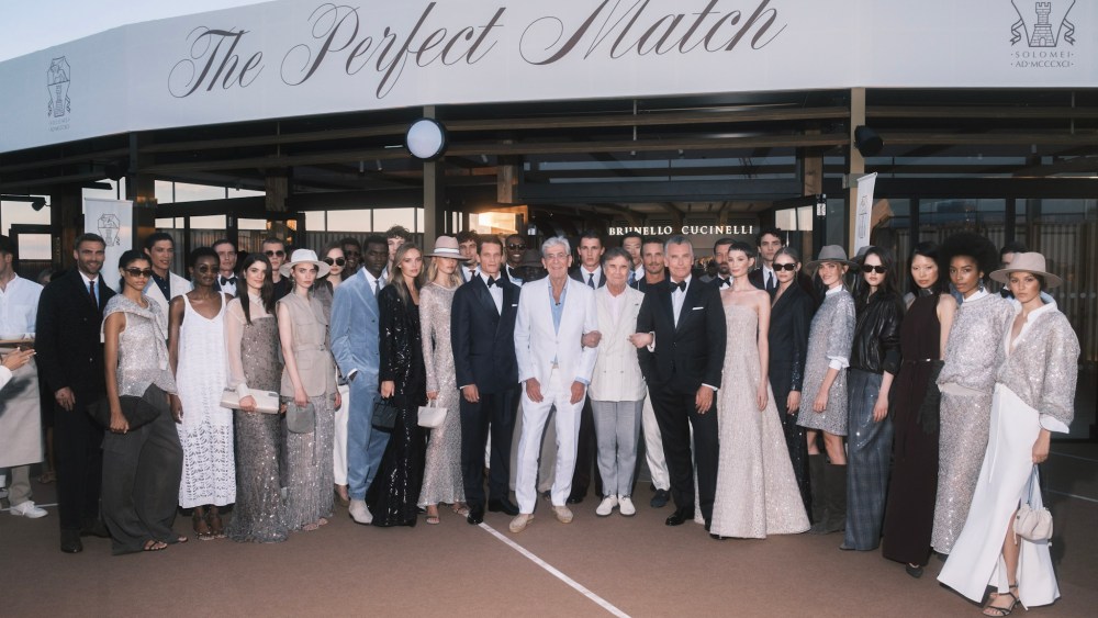 Brunello Cucinelli with Michael Ward in the middle at the Harrods Helideck celebrating the launch of "The Perfect Match," a special capsule collection exclusive to Harrods