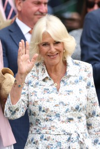 LONDON, ENGLAND - JULY 09: Queen Camilla waves as she attends on day ten of The Championships Wimbledon 2025 at All England Lawn Tennis and Croquet Club on July 09, 2025 in London, England. (Photo by Ezra Shaw/Getty Images)