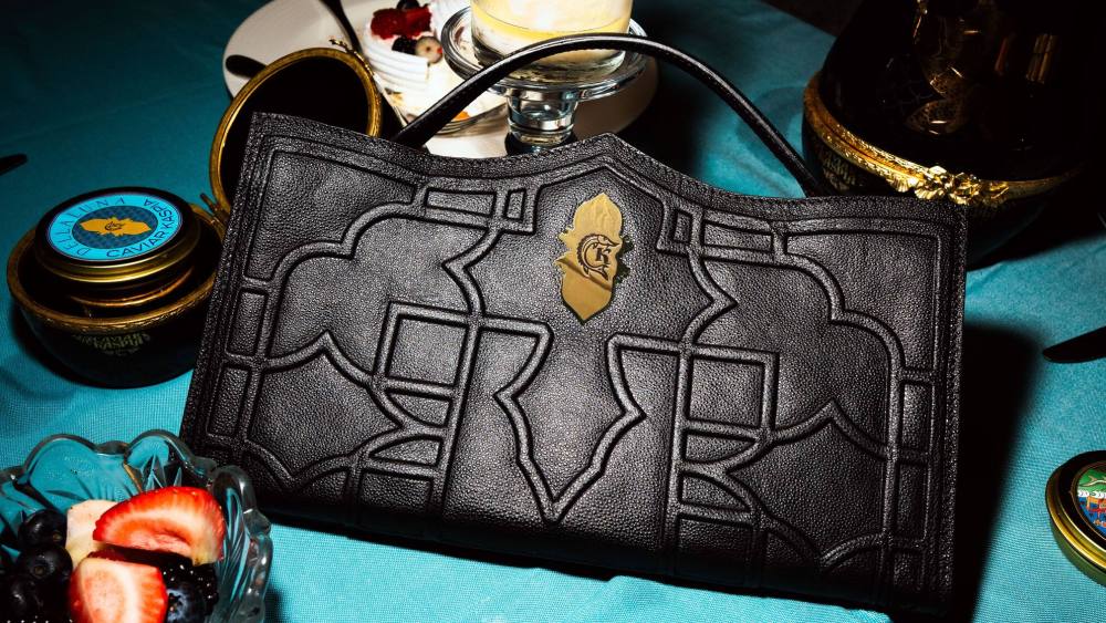 Caviar Kaspia has collaborated with Venetian leather goods maker Dellaluna on handbags.