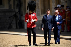 WINDSOR, ENGLAND - JULY 8:  King Charles III and President of France, Emmanuel Macron attend the Ceremonial Welcome for the state visit to the UK of the President of France Emmanuel Macron and his wife Brigitte Macron at Windsor Castle on July 8, 2025 in Windsor, England. President Emmanuel Macron and Mrs Brigitte Macron visit the UK in the first visit State Visit made by France in 17 years. They are staying at Windsor Castle, hosted by King Charles III and Queen Camilla, and a banquet will be held there in their honour. The Macrons will visit Imperial College, and the President will address Parliament during his stay.  (Photo by Dylan Martinez - WPA Pool/Getty Images)