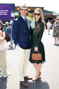 LONDON, ENGLAND - JULY 13: Henry Cavill and Natalie Viscuso, wearing Ralph Lauren, attend day fourteen of the Wimbledon Tennis Championships at the All England Trennis and Croquet Club at on July 13, 2025 in London, England. (Photo by Karwai Tang/Getty Images for Ralph Lauren)