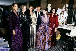 Designer Oscar de la Renta, with models including Alva Chinn and Karen Bjornson, previews his Fall 1977 Ready to Wear Collection, in New York City.