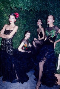 Models in black ruffled dresses with sequin embellishment after the Oscar de la Renta Resort Spring 1979 show in New York