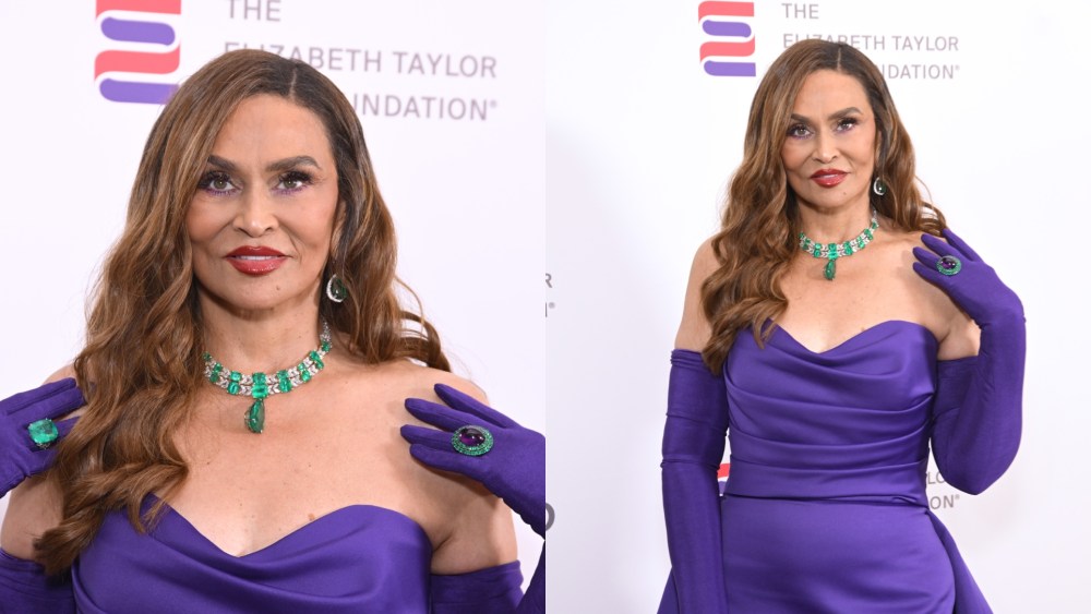 Tina Knowles wears a strapless purple gown and emerald jewels at the Elizabeth Taylor Night of Compassion event on Sept. 18, 2025 in Beverly Hills, Calif.