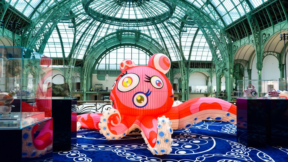 The Louis Vuitton stand at Art Basel Paris featuring artworks and handbag designs by Takashi Murakami