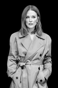 Balenciaga cotton maxi trenchcoat; Khaite boots; Bottega Veneta earrings; Jade Ruzzo Anna band in solid gold.