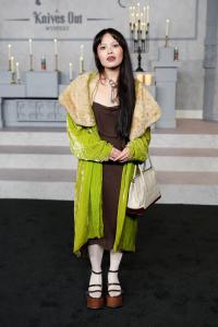 Mina Le at Netflix's "Wake Up Dead Man: A Knives Out Mystery" premiere held at the Academy Museum of Motion Pictures on November 17, 2025 in Los Angeles, California.