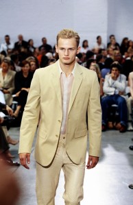 A model walks the runway in the Helmut Lang Spring 2001 Ready to Wear Runway Show on September 20, 2000, in New York City. Titled "When Love Comes to Town", Lang paid homage to designer Azzedine Alaia whose retrospective opened at the Guggenheim in Soho the same night.