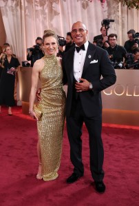 Lauren Hashian and Dwayne Johnson at the 83rd Annual Golden Globes held at The Beverly Hilton on January 11, 2026 in Beverly Hills, California.
