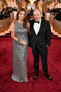 Dina De Luca and Hans Zimmer at the 83rd Annual Golden Globes held at The Beverly Hilton on January 11, 2026 in Beverly Hills, California.