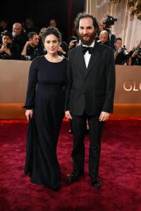 Sara Rossein and Josh Safdie at the 83rd Annual Golden Globes held at The Beverly Hilton on January 11, 2026 in Beverly Hills, California.