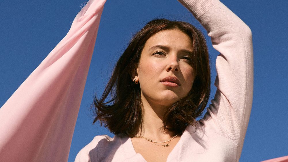Millie Bonnie Bongiovi, professionally Millie Bobby Brown, for Mills by Millie Bobby Brown.