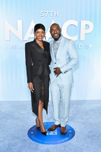 Caroline Chikezie and Adrian Holmes at the 57th NAACP Image Awards held at the Pasadena Civic Auditorium on February 28, 2026 in Los Angeles, California.