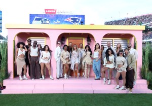 Young Miko, Karol G, Cardi B, David Grutman and Alix Earle pose onstage during the Apple Music Super Bowl LX Halftime Show at Levi's Stadium on February 08, 2026 in Santa Clara, California.
