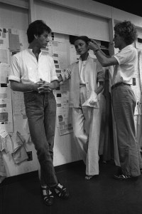 Calvin Klein fitting models with outfits from his resort 1977 ready to wear collection on August 16, 1977 in New York. Article title: 'Direction: Natural