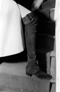 Maud Frizon debut over the knee suede buckle boots at Favor France, Paris on December 19, 1969.