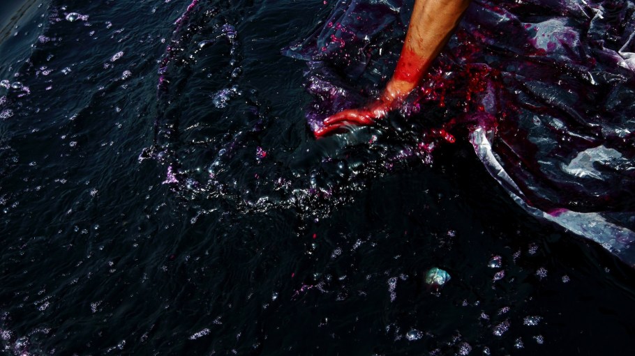 A worker washes in the discharge from chemical factories into the river water. The factories are discharging untreated chemicals into water bodies which are destroying fish and other aquatic life. Every day a large amount of the industrial waste water flows into the Turag River from the Gazipur Industrial District.