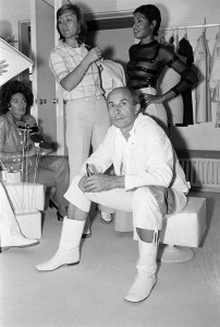 Andre Courreges with models in his Paris studios during a fitting for his fall 1972 collection.