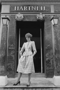 Model Wendy Howland poses in a Norman Hartnell’s spring 1982 collection outside the Hartnell boutique in London, 1982.
