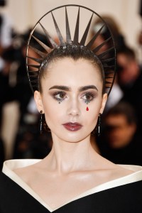 NEW YORK, NY - MAY 07:  Lily Collins attends the Heavenly Bodies: Fashion & The Catholic Imagination Costume Institute Gala at The Metropolitan Museum of Art on May 7, 2018 in New York City.  (Photo by Frazer Harrison/FilmMagic)